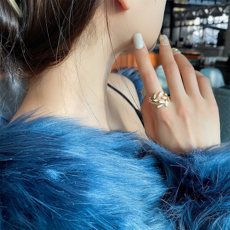 Hattie™ - ADJUSTABLE RING WITH LEAF DESIGN AND WHITE OPAL ACCENT